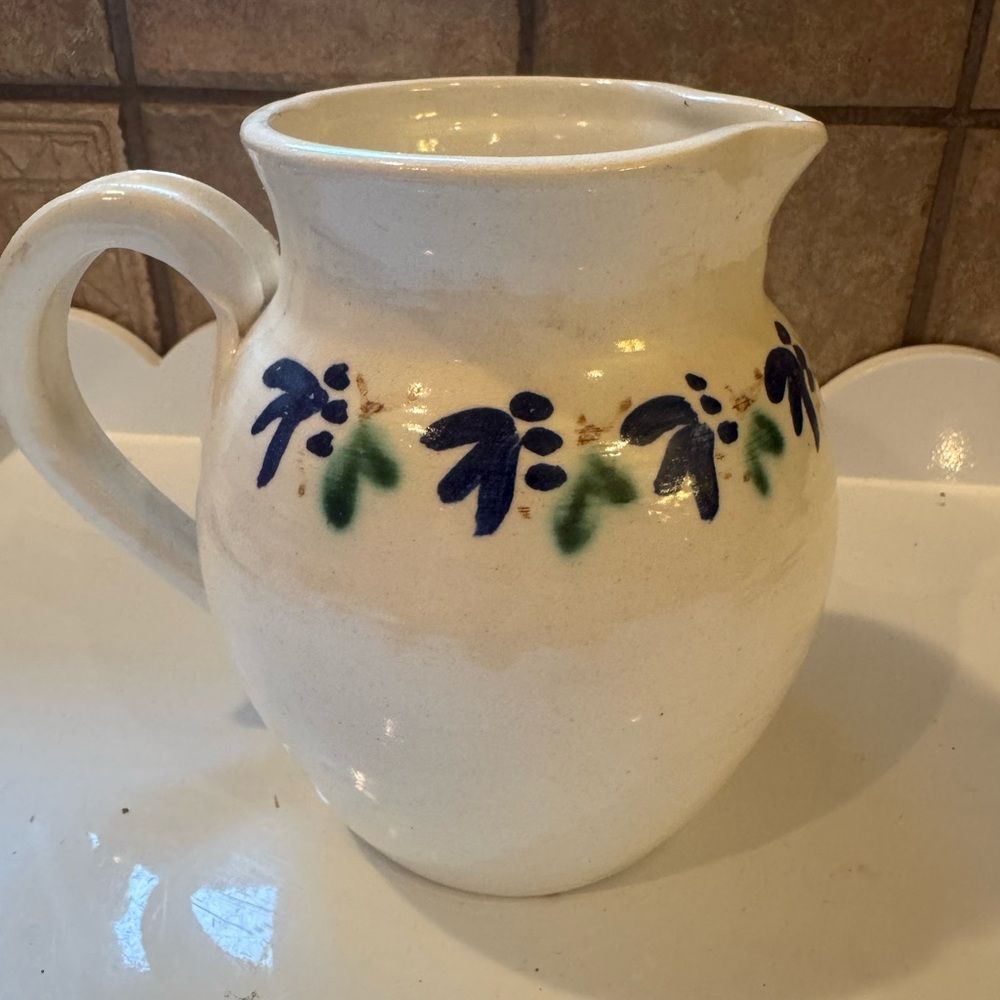 Handcrafted Ceramic Pitcher with Blue and Green Floral Design. About 8”